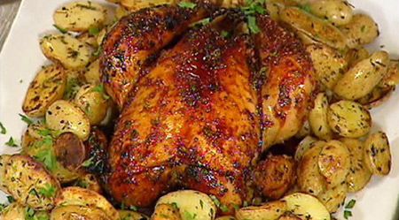 עוף בזיגוג הדרים עם תפוחי אדמה צלויים